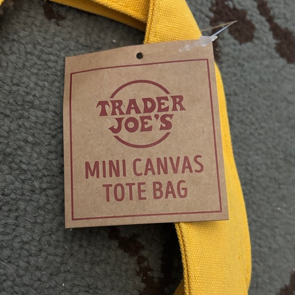 Trader Joe's Yellow and White Canvas Tote Bag - Picture 2 of 7